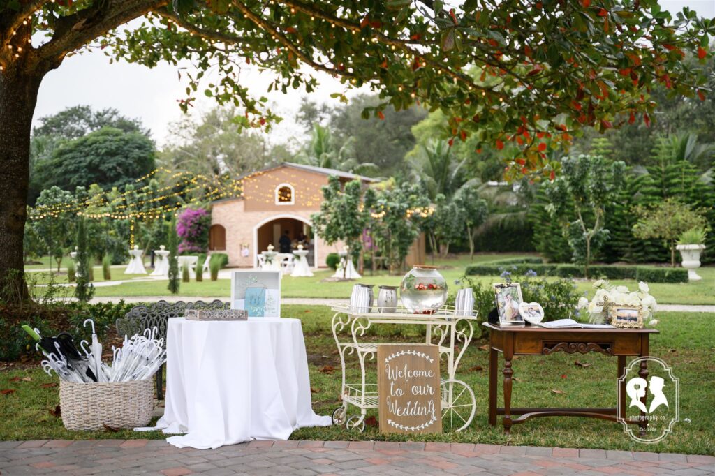 Cinco Farm farmhouse and gardens lit for an evening wedding celebration in Miami